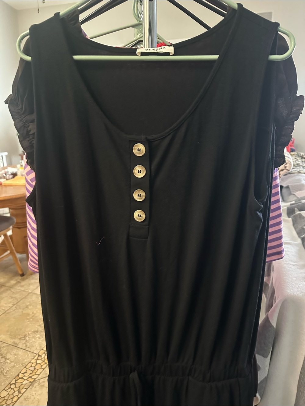 Black Sleeveless Button-Front Tank Jumpsuit by Serenoa